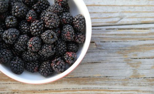 Bowl of fresh,sweet blackberries on old gray wood. ** Note: Soft Focus at 100%, best at smaller sizes