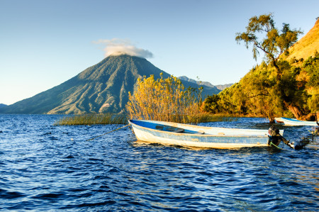 lake, boat, and volcano stock photo