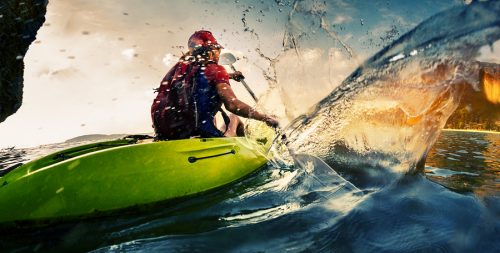 Stock photography capturing a kayaker in action