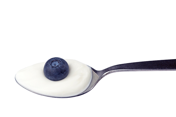 Spoon with yogurt and blueberry makes a simple stock photo you can easily take in your kitchen