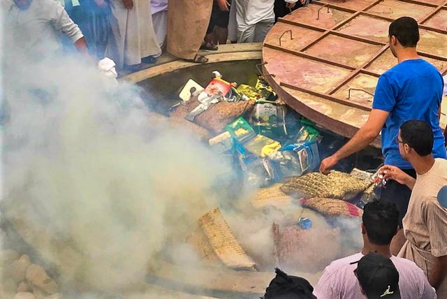 Shuwa being covered for cooking